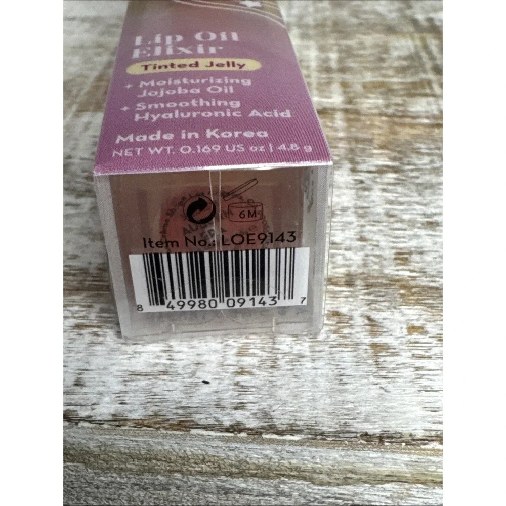 The Crème Shop Lip Oil Elixir Auburn Era Tinted Jelly | MSRP = $12
